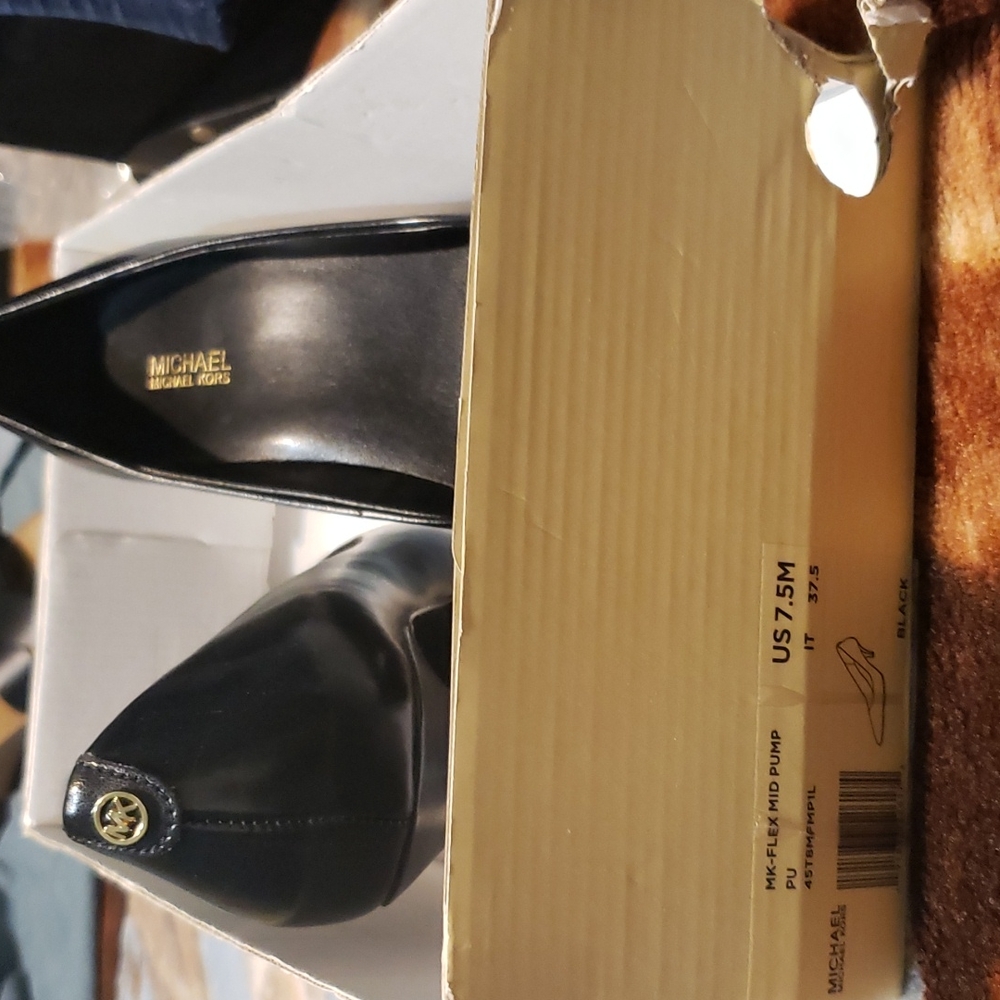 Brand- Michael Kors Size- 7.5 Color- Black